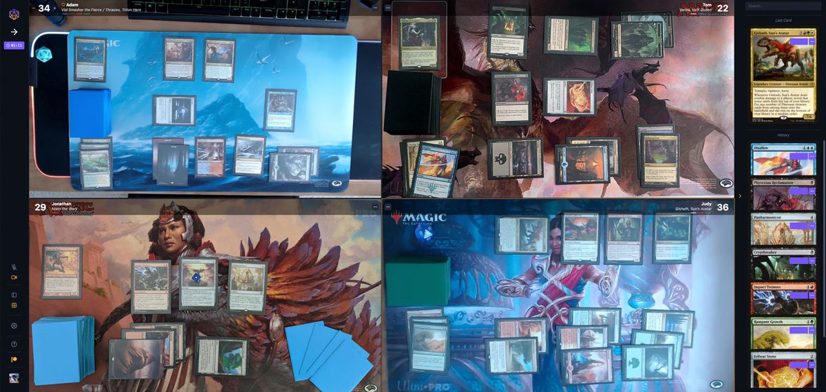 SpellTable: four webcam feeds, each pointed at a player's playmat, with the last recognised card in a sidebar